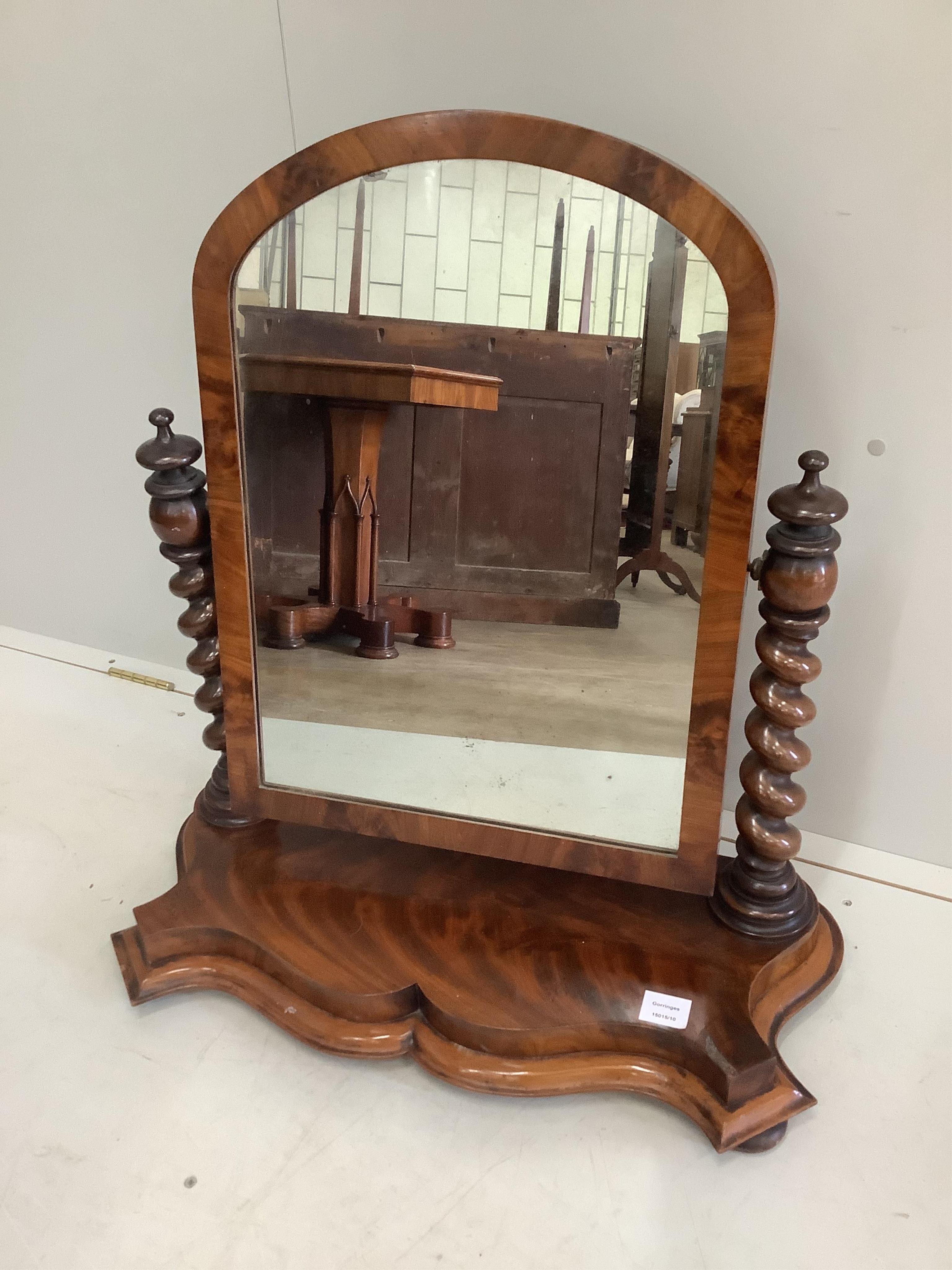 A Victorian mahogany toilet mirror, width 71cm, height 74cm. Condition - fair